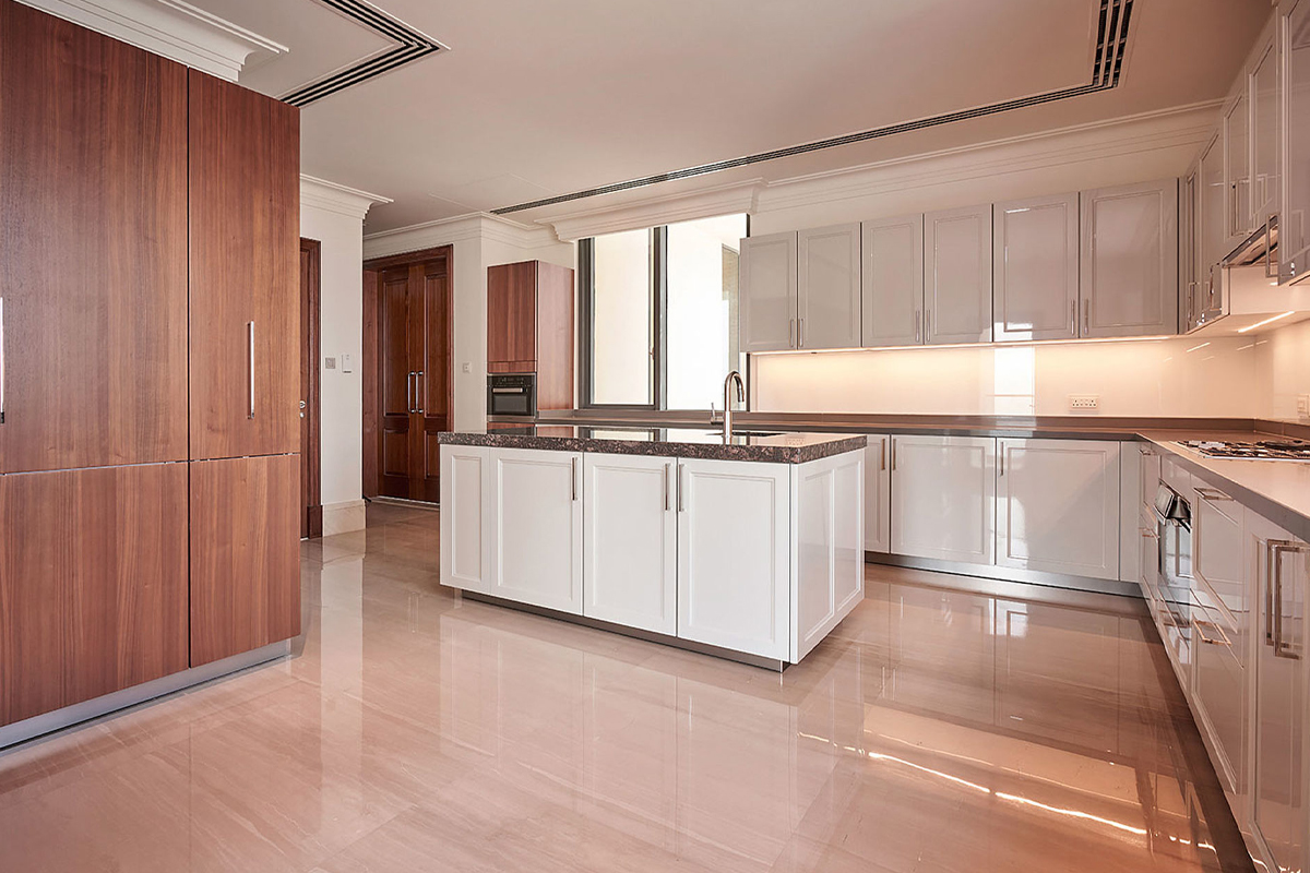Minimal design Kitchen Island that also provides extra space & storage. SieMatic UAE for 118 Downtown Penthouses.