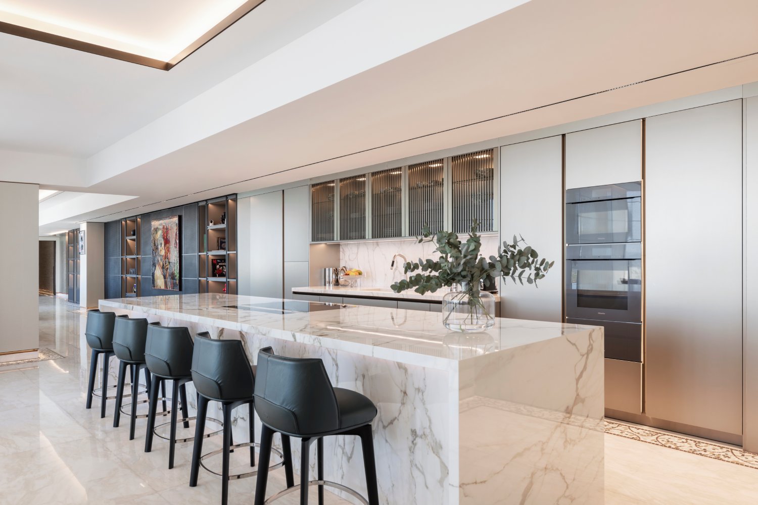 Schmalenbach's shelving system and bespoke Siematic kitchen at Bulgari apartments Dubai. Project by Al Gurg Living.